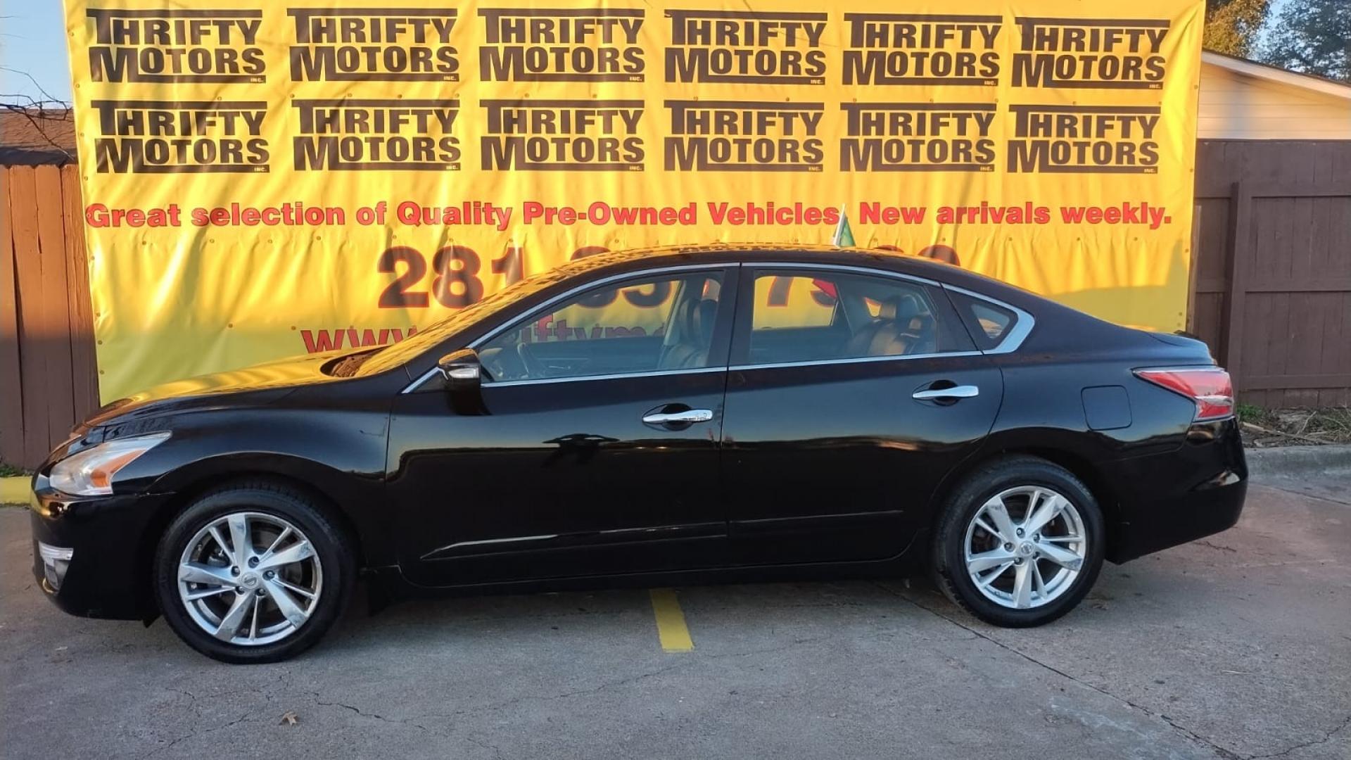 2015 Nissan Altima (1N4AL3AP0FN) , located at 16710 Clay Rd., Houston, TX, 77084, (281) 859-7900, 29.834864, -95.656166 - Photo#0